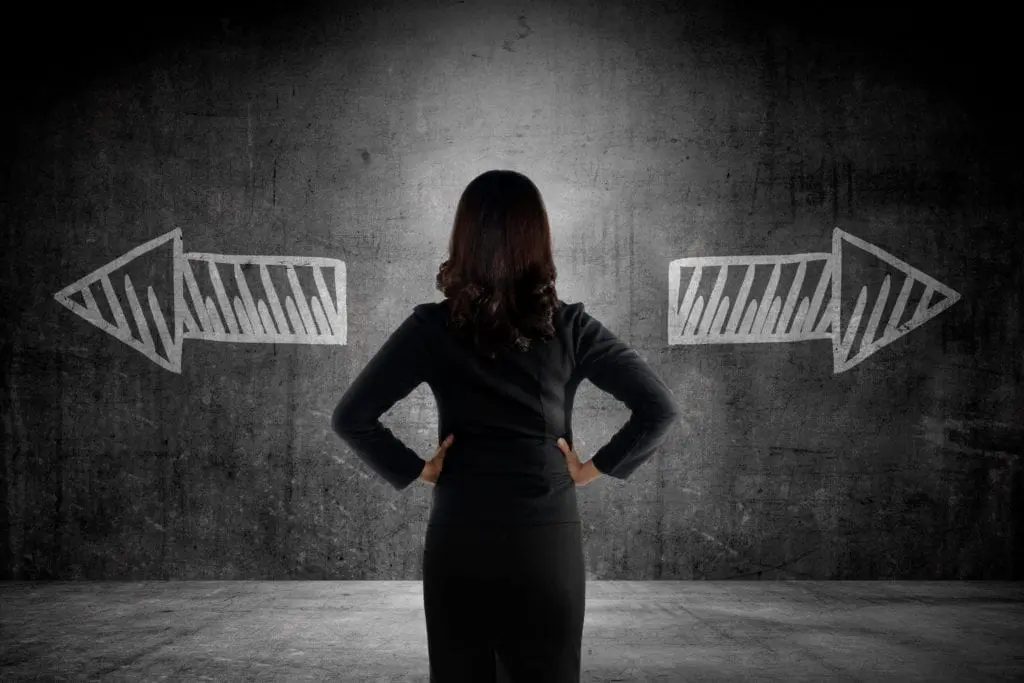 Business woman has to choose between two ways for Teachable vs Udemy concept