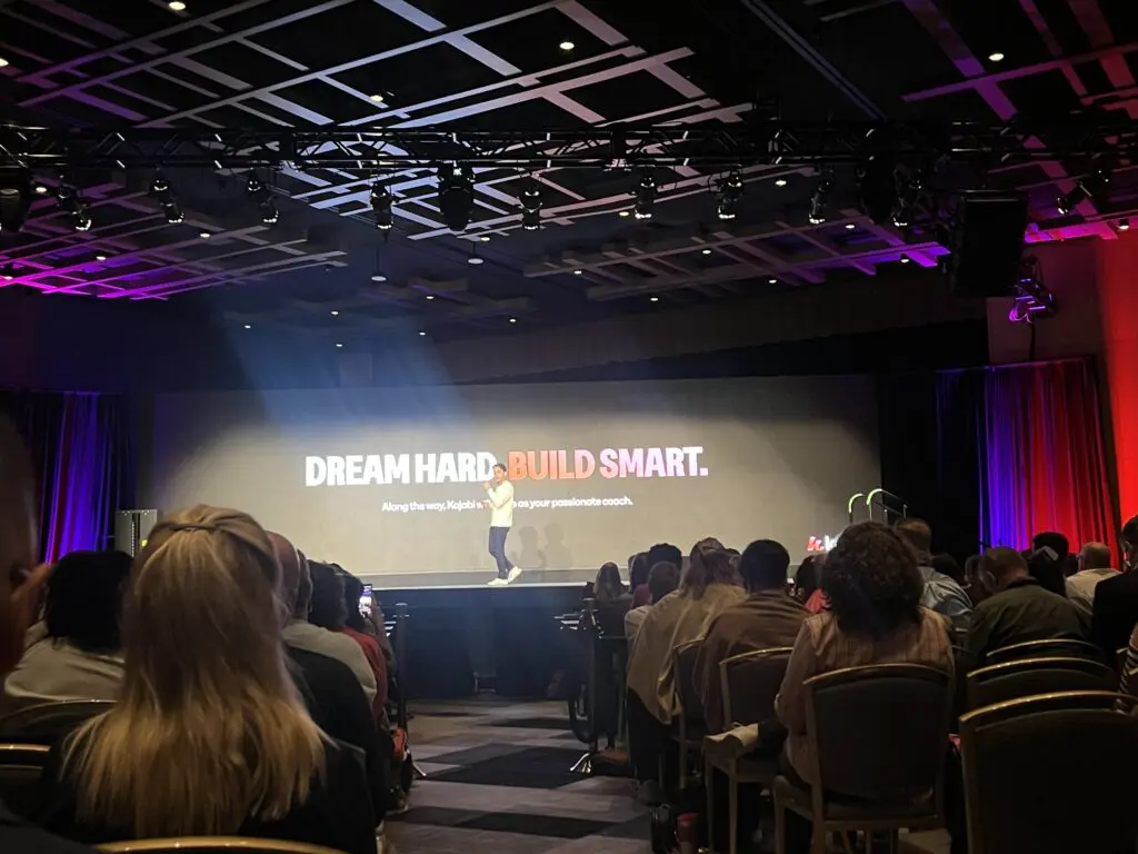 Photo of Ahad Khan speaking on stage at Kajabi Hero Live 2024