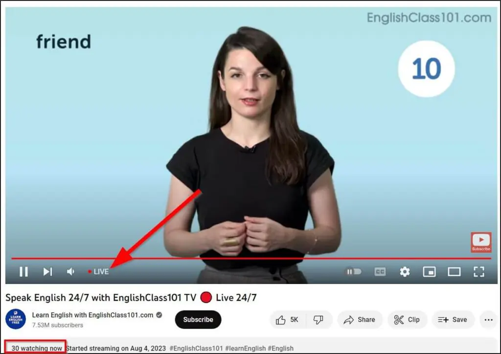 YouTube live screenshot with red arrow pointing to Live on screen and how many people are watching now in red box