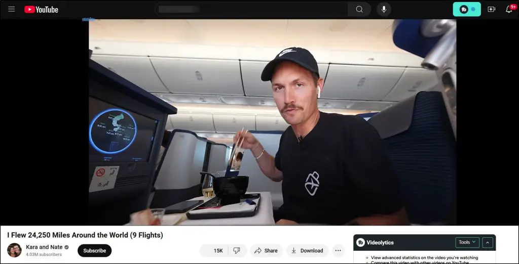 Kara and Nate Travel Channel on YouTube, image of Nate sitting on airplane with chopsticks titled "I Flew 24,250 Miles Around the World (9 Flights)"