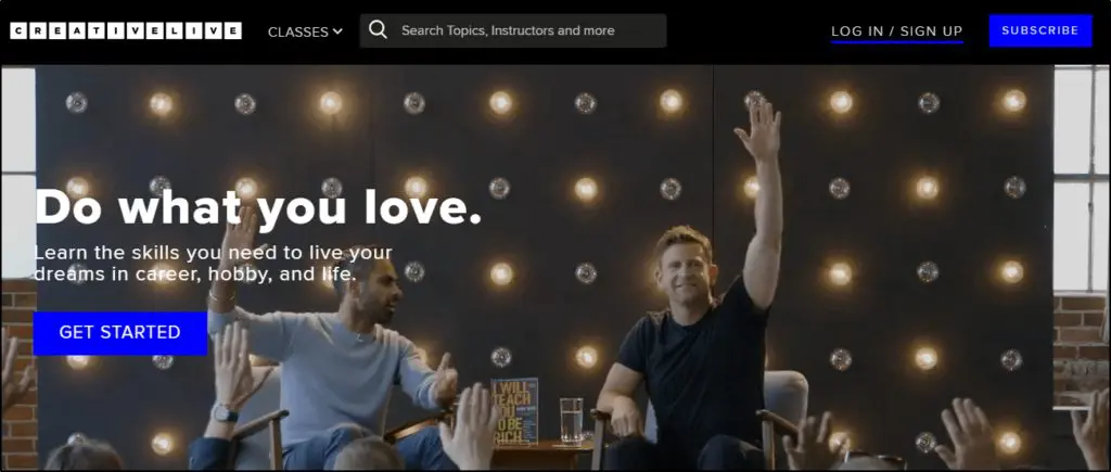 CreativeLive  - "Do what you love" above button to "Get started", 2 men presenting on a stage sitting at a table with their hands raised in the air 