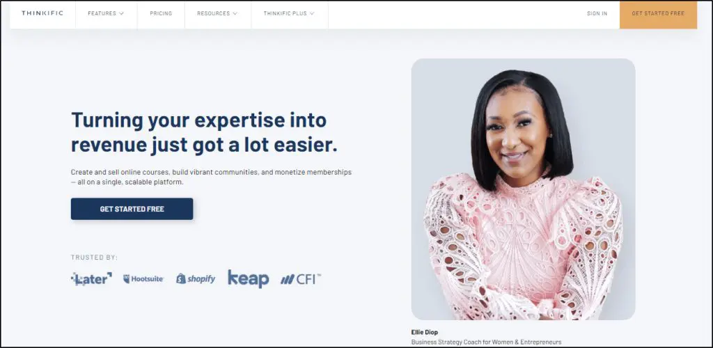 Thinkific membership home page with a woman smiling towards the user