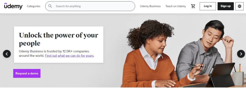 Udemy - "Unlock the power of your people", request a demo button
