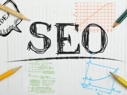 Using SEO to Sell Online Course - Image of letters "SEO" penciled onto a sheet of graph paper