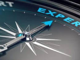 known as expert - compass with needle pointing the word expert