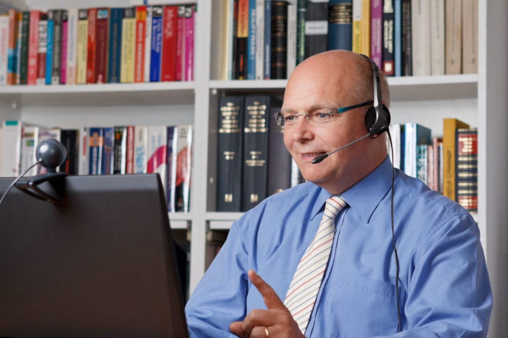 Photo of man teaching online for teach online concept