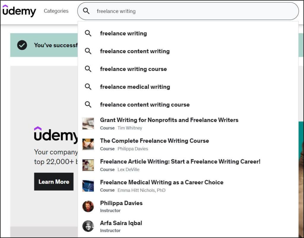 freelance writing in search bar with a list of search terms underneath it