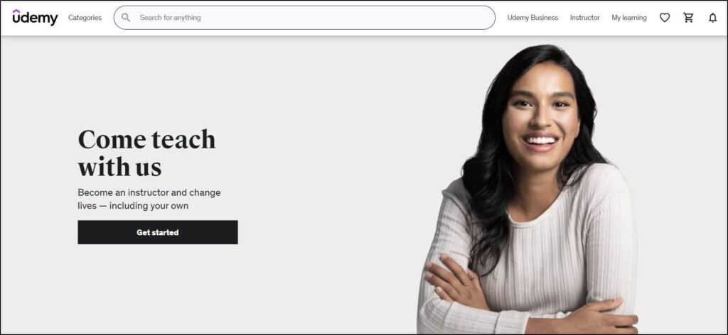 screenshot of Udemy homepage
Woman smiling w/arms crossed
Come teach with us next to woman with Get Started Button