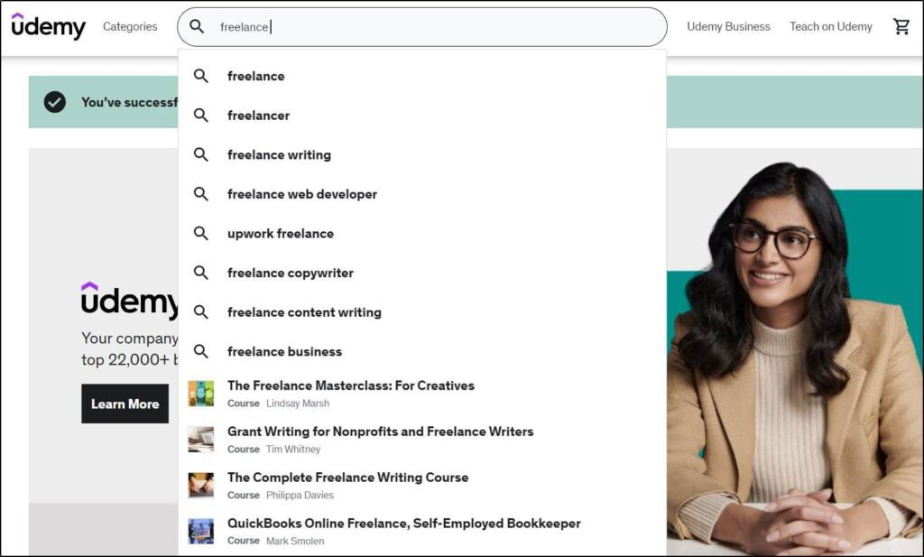 Udemy categories page with freelance in search bar
list of freelance words below search bar
Woman in glasses wearing a blazer