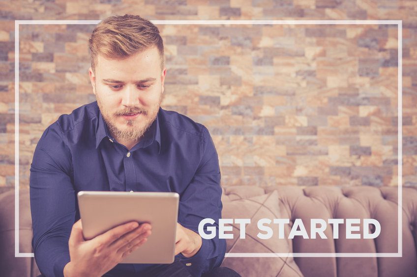 Blond mustached man on table for get started as course creator concept