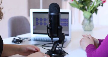 Podcast Microphone and Laptop on Desk